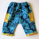 Gathered waist, wide legged Basic Newborn Pant from Made by Rae, sewn in blue modern print for main pants fabric with yellow contrasting pockets and cuffs.