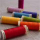 Gutermann Sew-All Threads in bright colours on fabric
