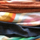 Fabrics from the collection folded in a stack