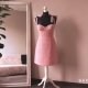 pink bustier dress on a manekin