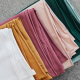 Various Folded Jersey fabric showing various colourways