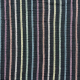 Photo of black fabric with muted rainbow stripes.