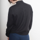Back-view photo of woman wearing Beau, a button-down long-sleeved shirt with pleating on either side of the front concealed button placket, in black.